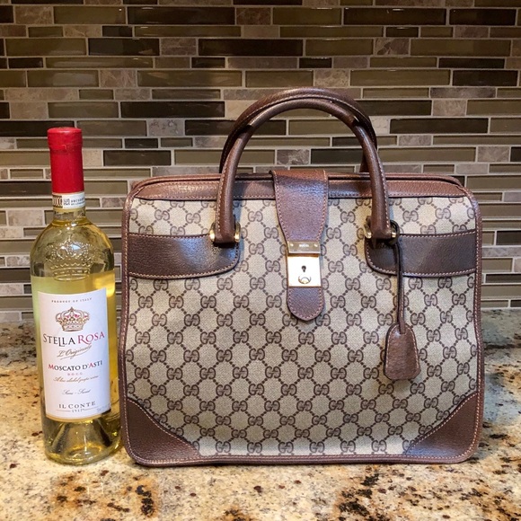 Gucci Handbags - Gucci bag, carry on luggage🧳Excellent condition